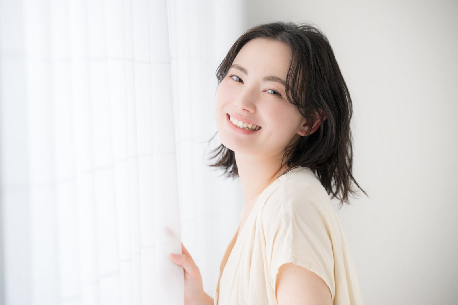 根管治療を終えて笑顔の女性